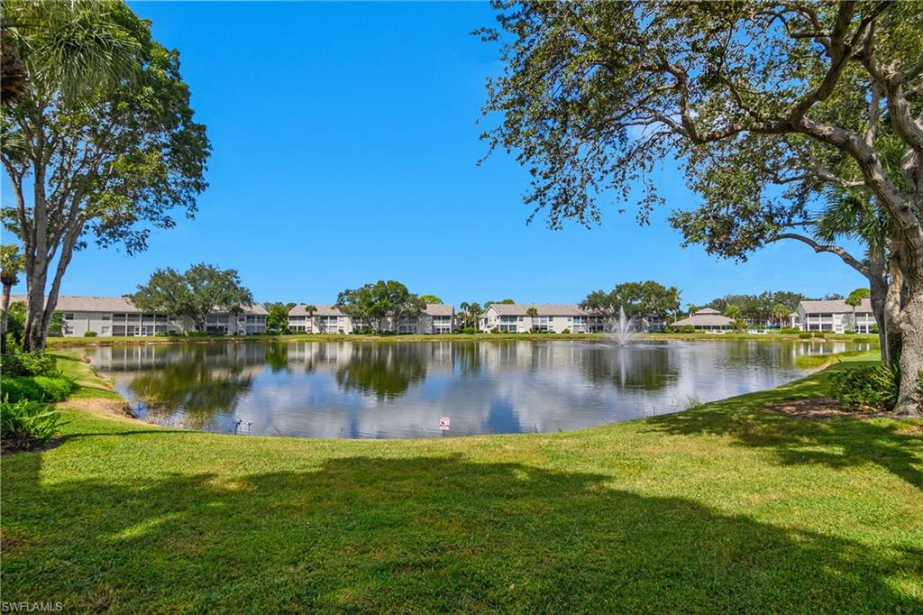 Water view featuring nearby suburban area