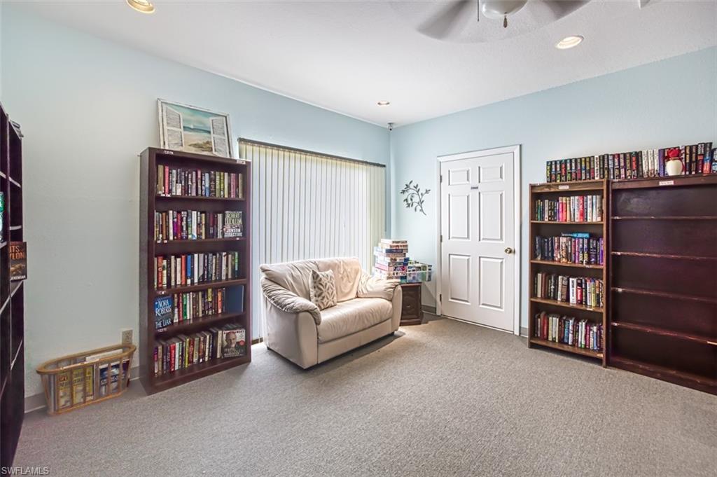 Sitting room featuring carpet floors, recessed lighting, and a ceiling fan