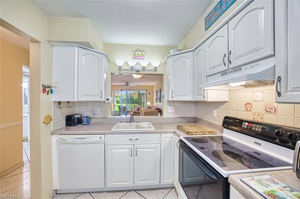 Kitchen with white appliances