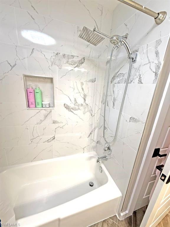 Full bathroom featuring shower / bath combination