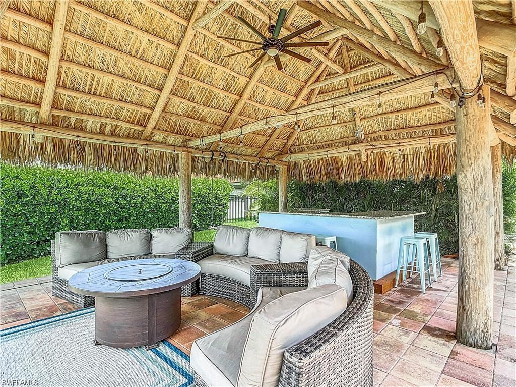 View of patio featuring a ceiling fan and an outdoor hangout area