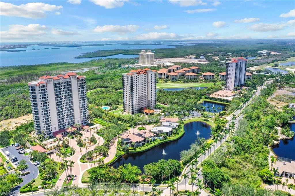 Bird's eye view of a large body of water and apartment complex
