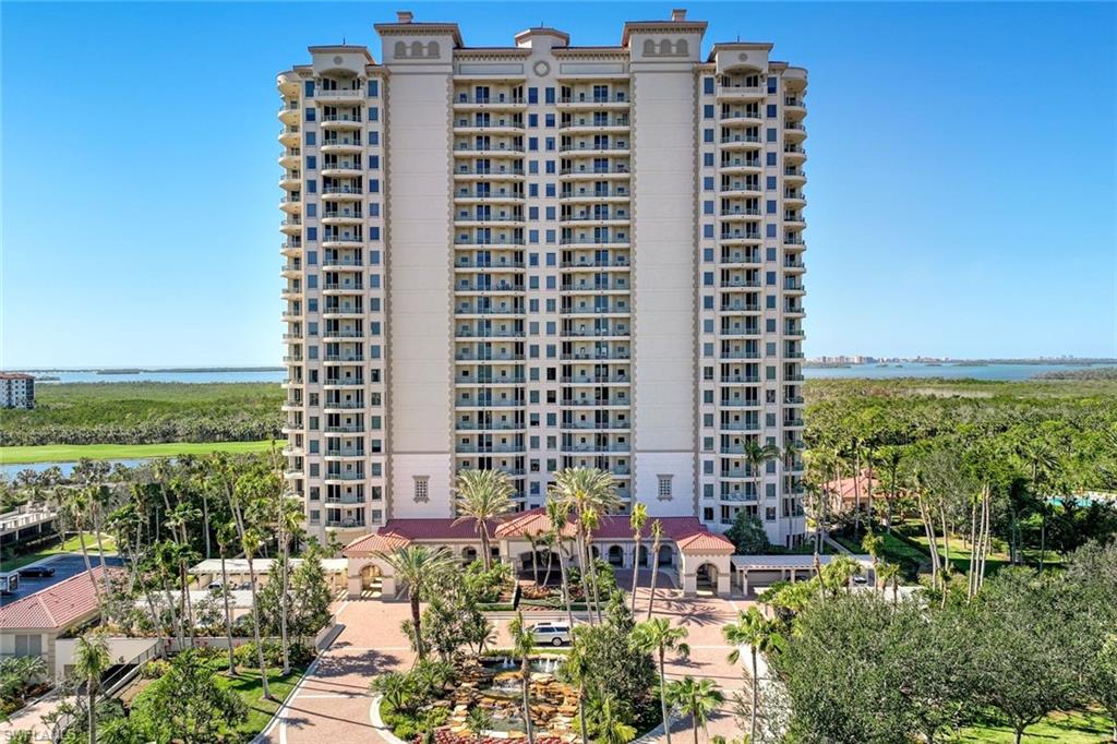 View of apartment building / complex with a water view
