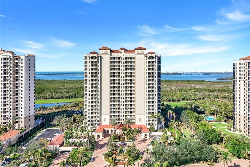 View of apartment building / complex with a water view