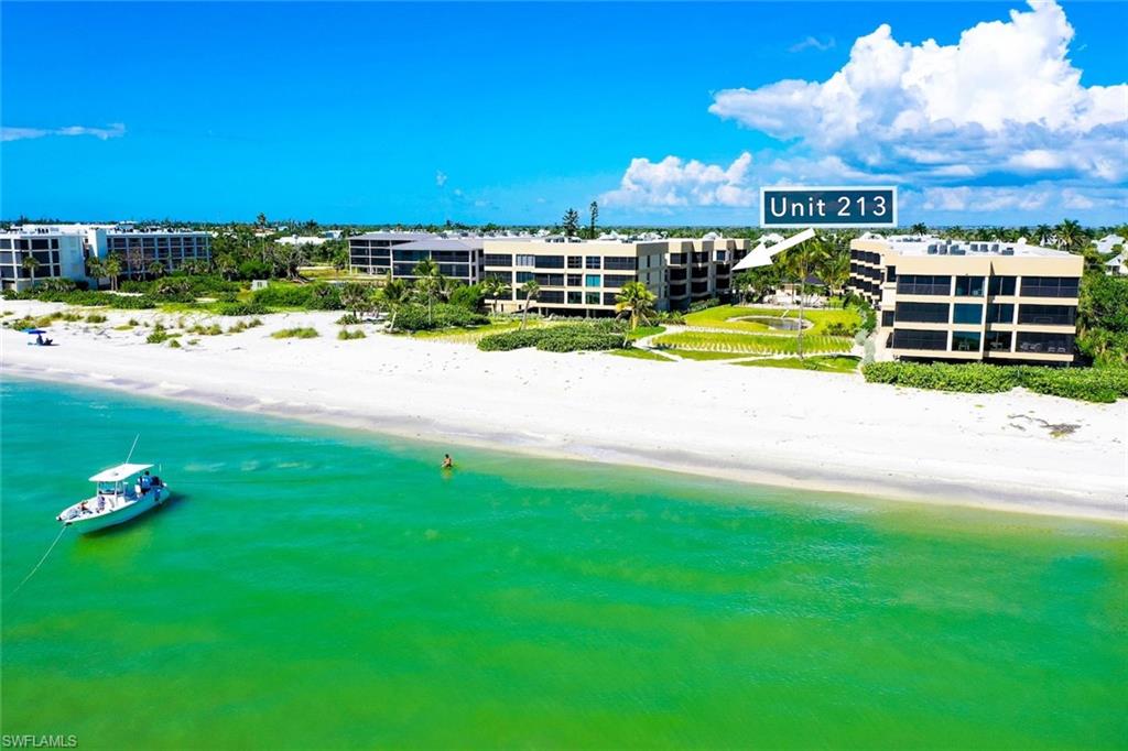 Bird's eye view of waterfront with a beach
