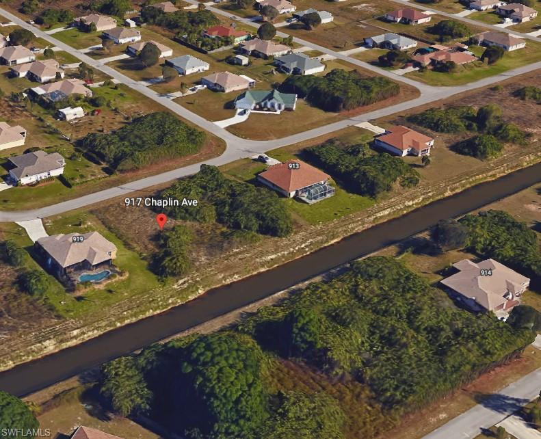 View of property location featuring nearby suburban area