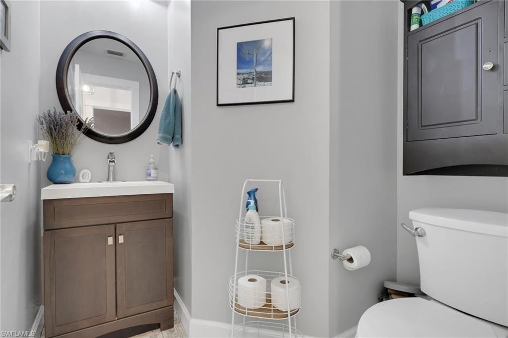 Half Bath on the first floor across from the bedroom on the first floor