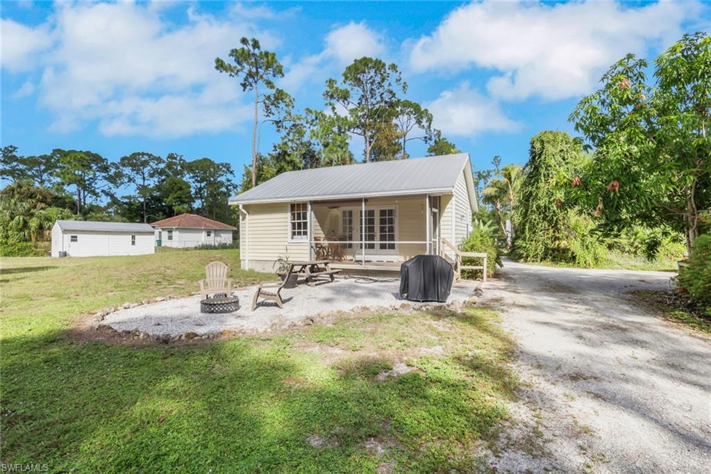 Guest House Featuring Living & Dining Room, Full Kitchen, 1 Bedroom, 1 Bathroom, Washer/Dryer, Screened Patio Area, Carport, Firepit Area, Extra Parking with it's own private driveway. (Completely private from the main house)