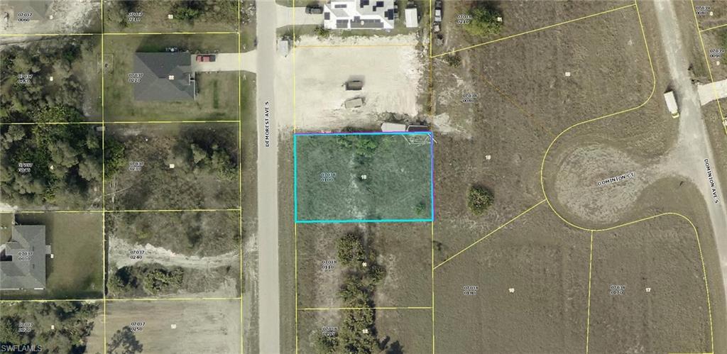 Aerial map of property and surrounding area with property parcel outlined