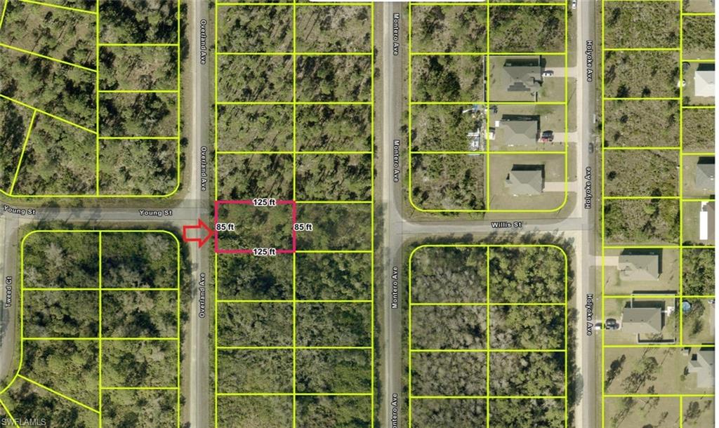 Aerial map of property and surrounding area featuring property parcel outlined