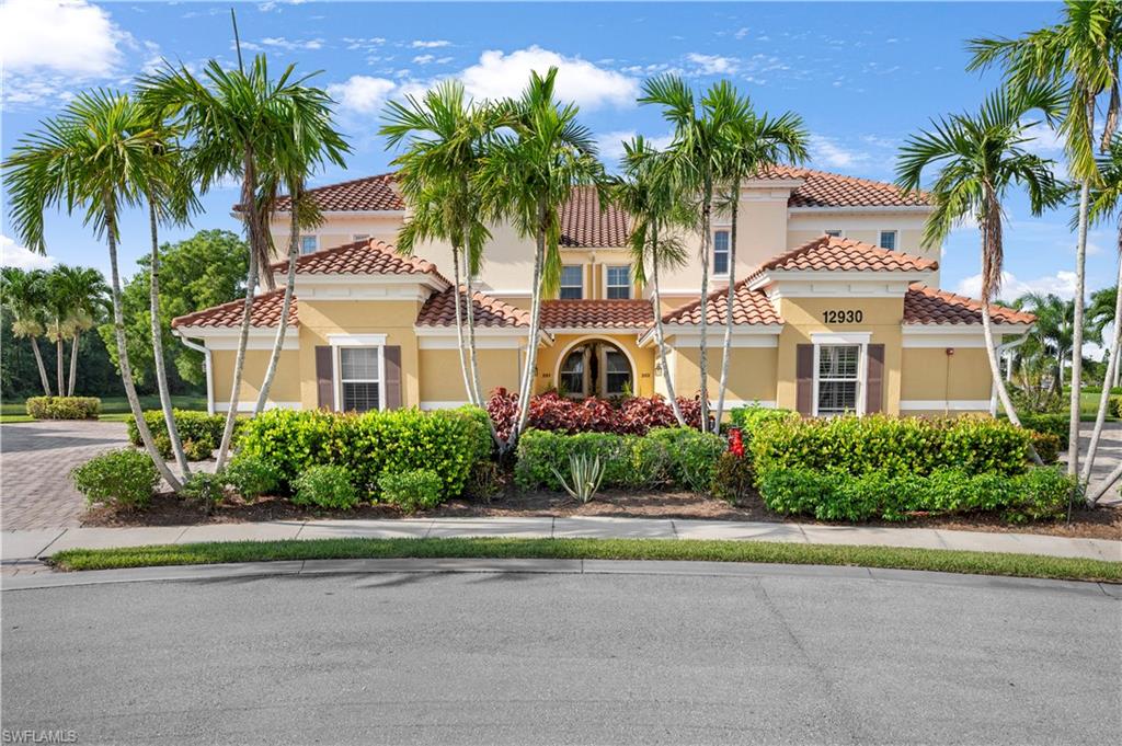 Mediterranean / spanish-style home featuring stucco siding and a tile roof