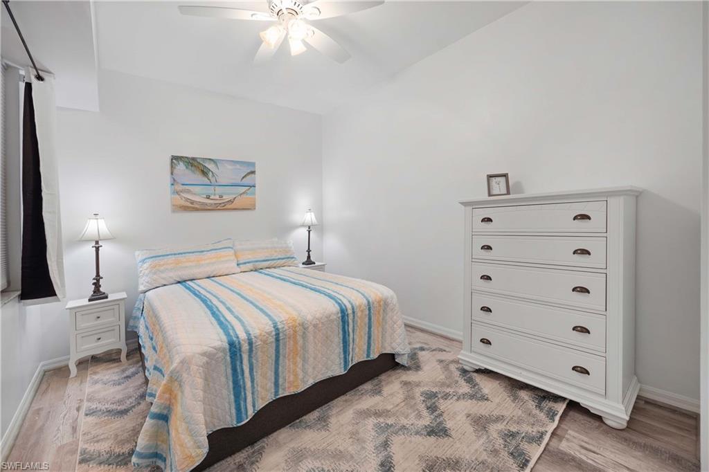 Bedroom featuring light wood-type flooring and ceiling fan