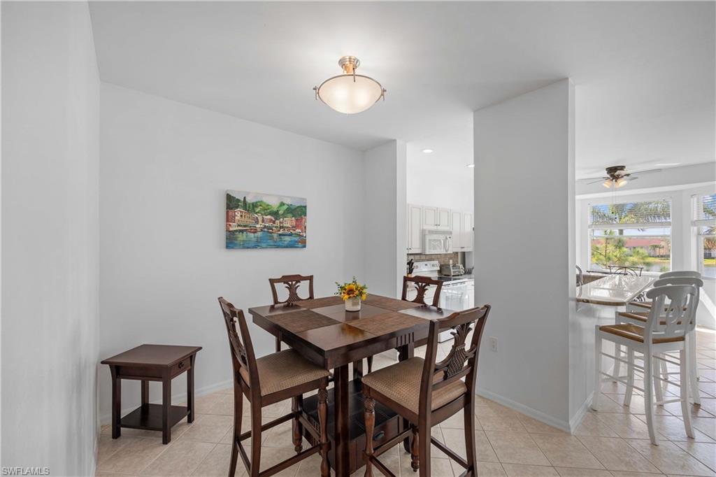 Tiled dining area with ceiling fan