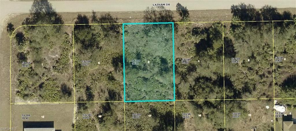 Aerial overview of property's location with property parcel outlined