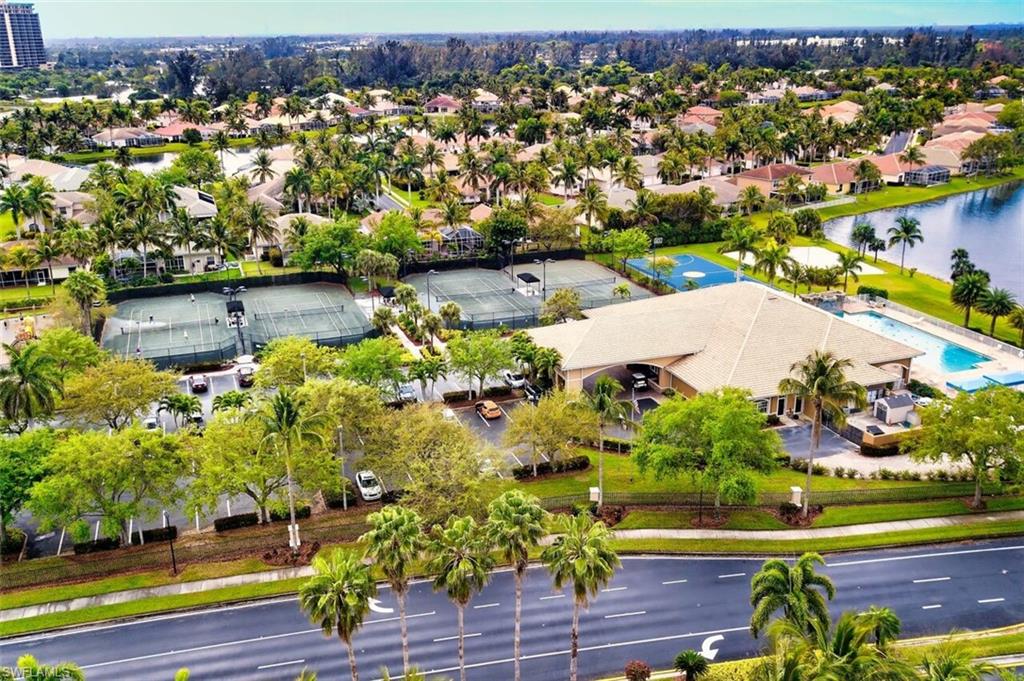 Aerial view of residential area with a large body of water