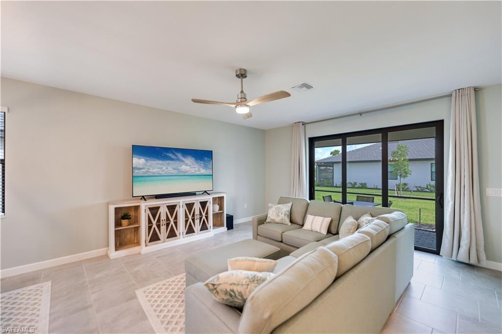 Tiled living room with ceiling fan