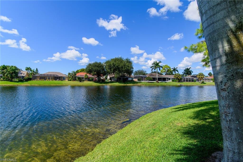 Water view featuring nearby suburban area