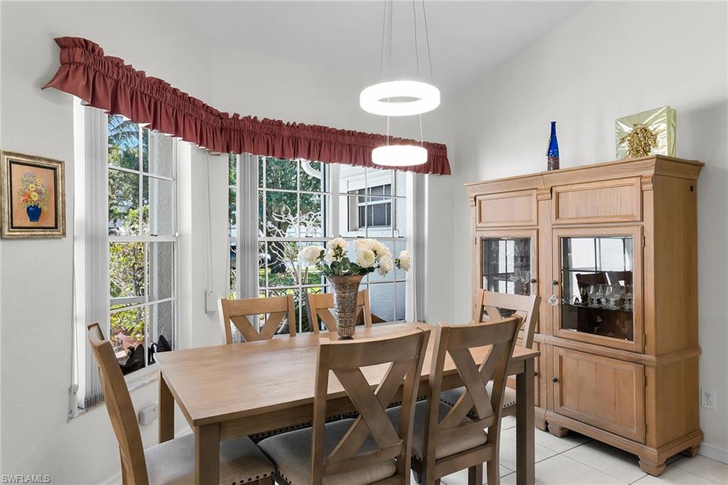 Dining room featuring light tile patterned floors