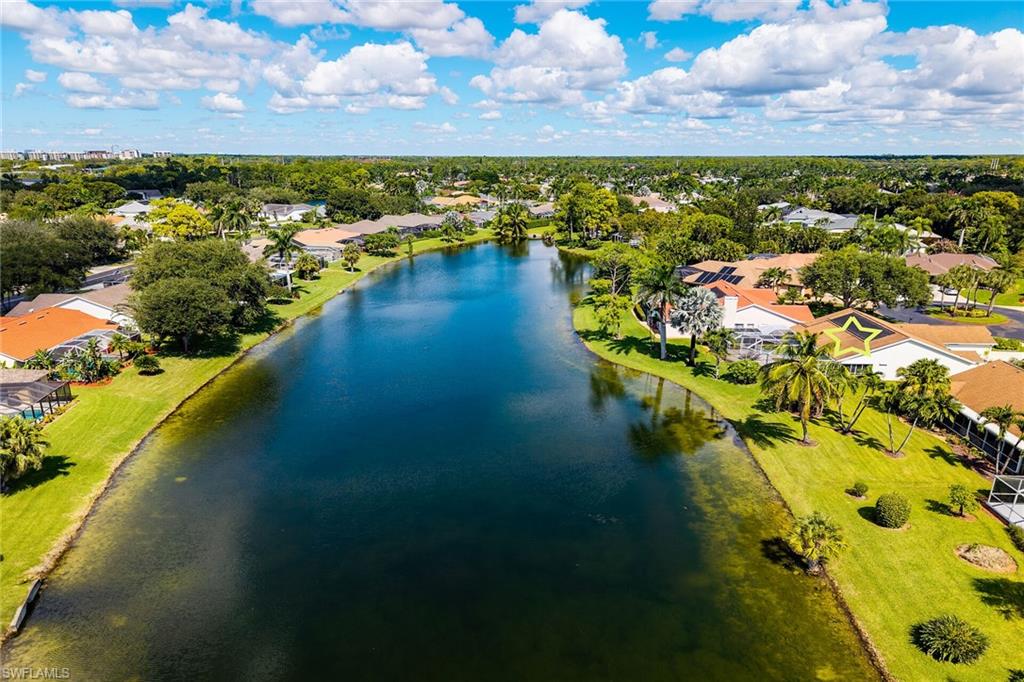 Aerial view of residential area with a nearby body of water
