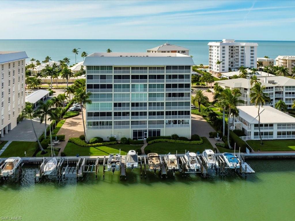 Aerial view of a nearby body of water and apartment complex