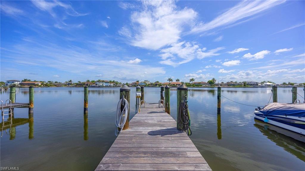 Dock featuring a water view