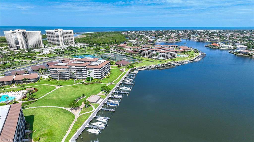 Aerial view of a nearby body of water and a marina