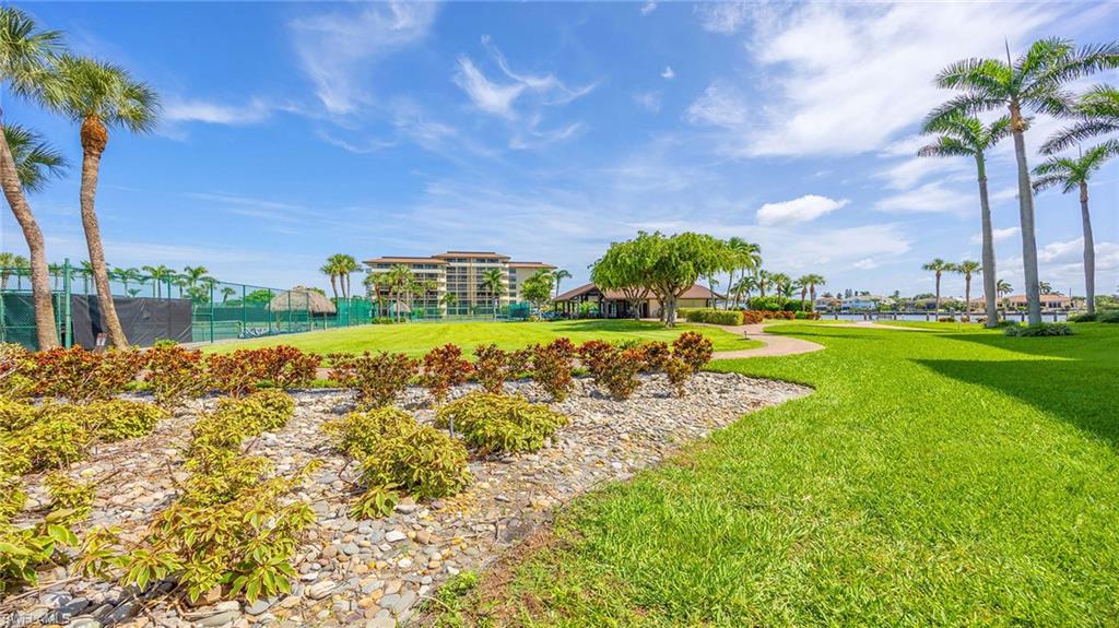View of community featuring a water view