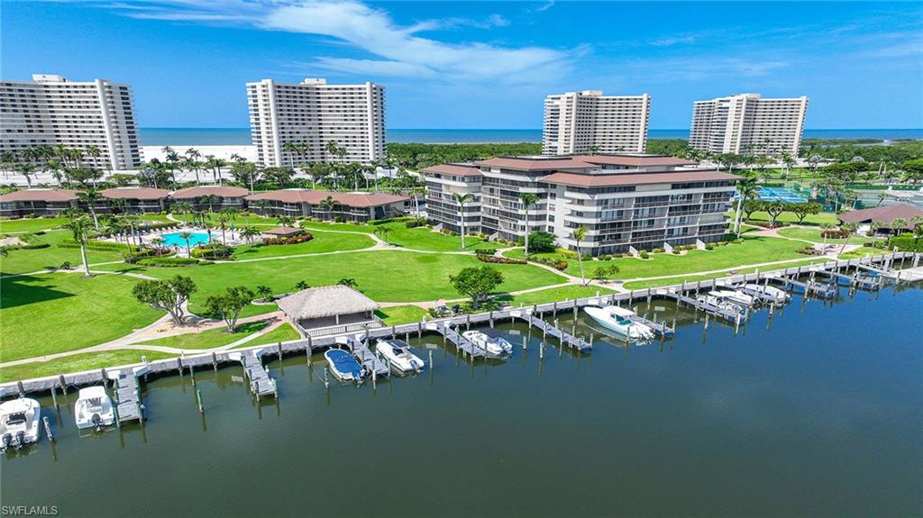 Bird's eye view of a nearby body of water and a marina