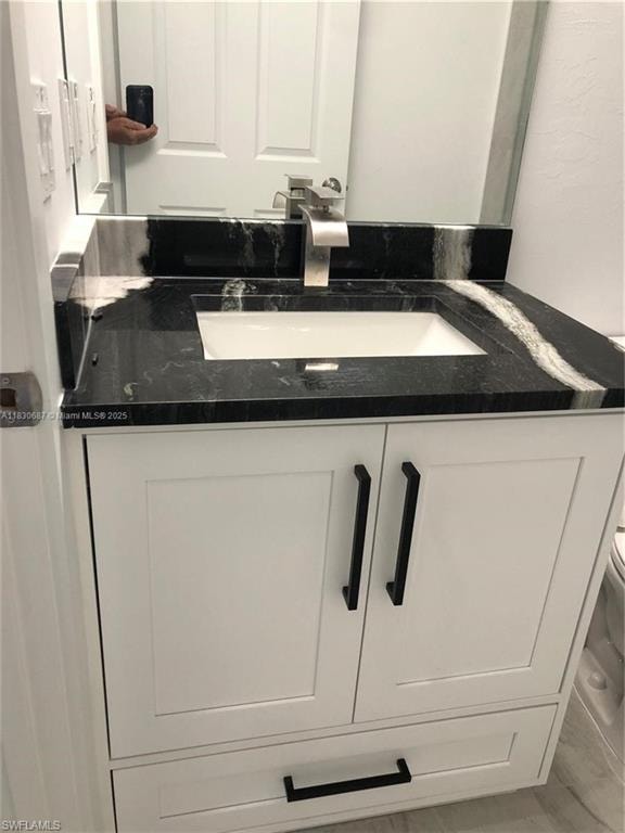 Half bath featuring vanity