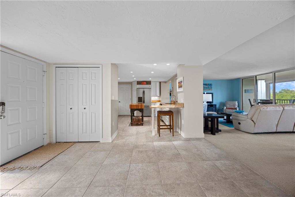 Living room with light colored carpet