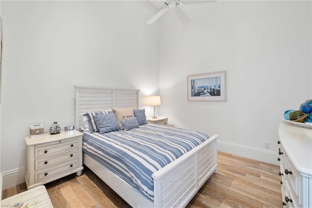 Bedroom featuring light wood-style flooring and ceiling fan