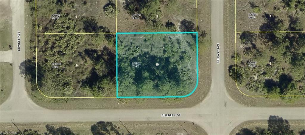 Aerial map of property and surrounding area featuring property parcel outlined