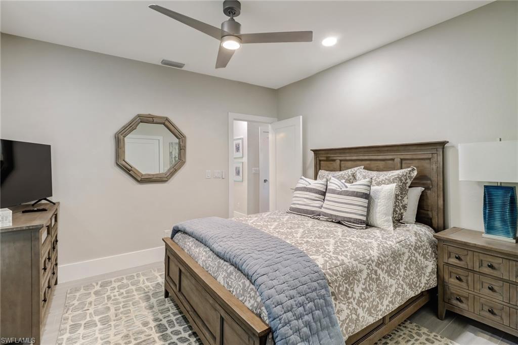 Bedroom featuring baseboards and ceiling fan