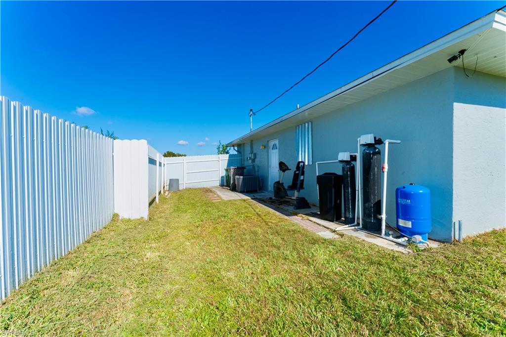 View of fenced backyard