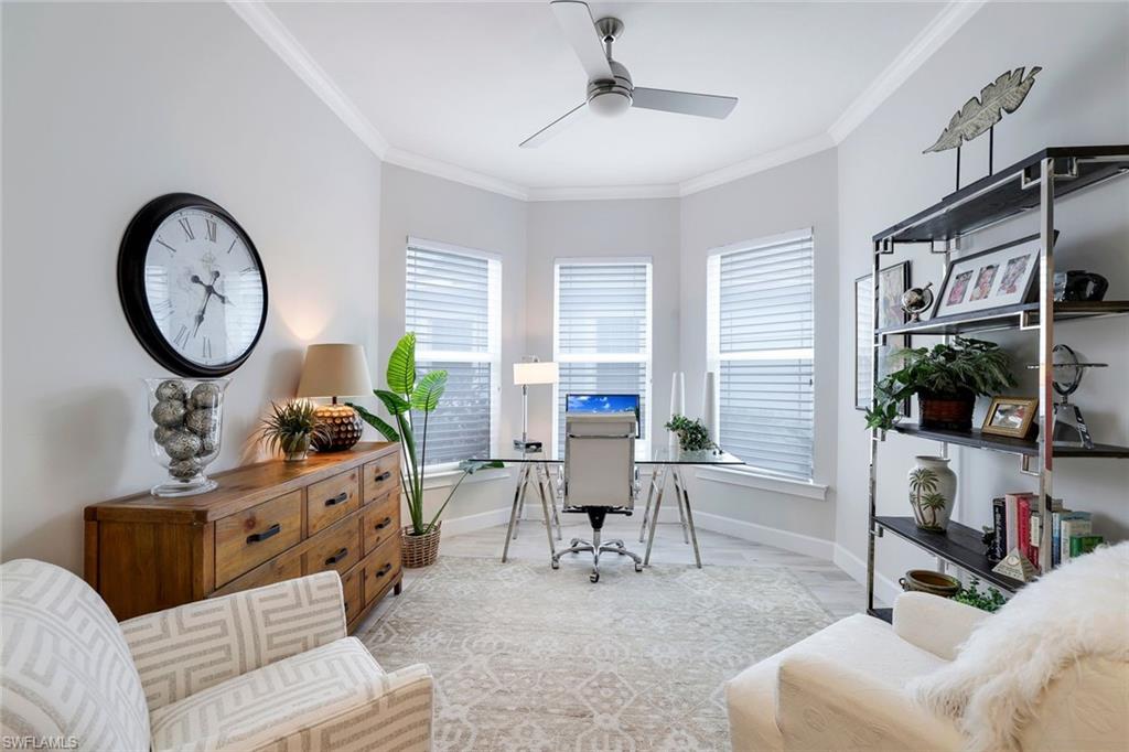 Office featuring ceiling fan and crown molding
