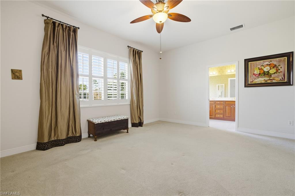 Primary bedroom with ensuite bathroom