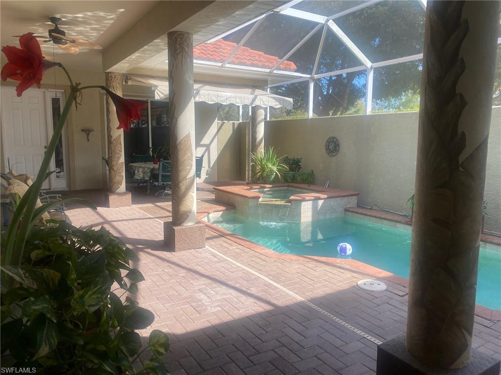 Courtyard Pool Spa and  patio under screened lanai