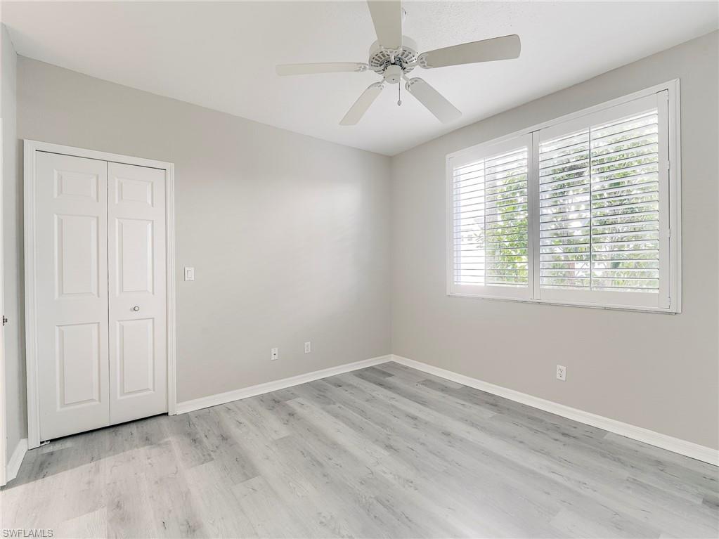 Guest bedroom has walk-in closet