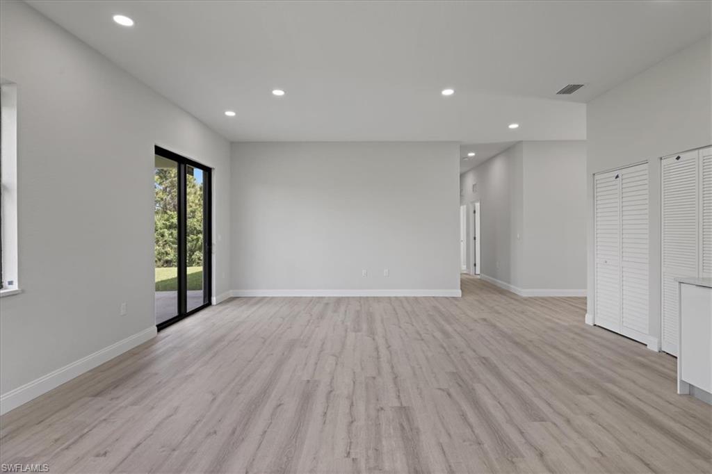 Spare room with recessed lighting and light wood finished floors