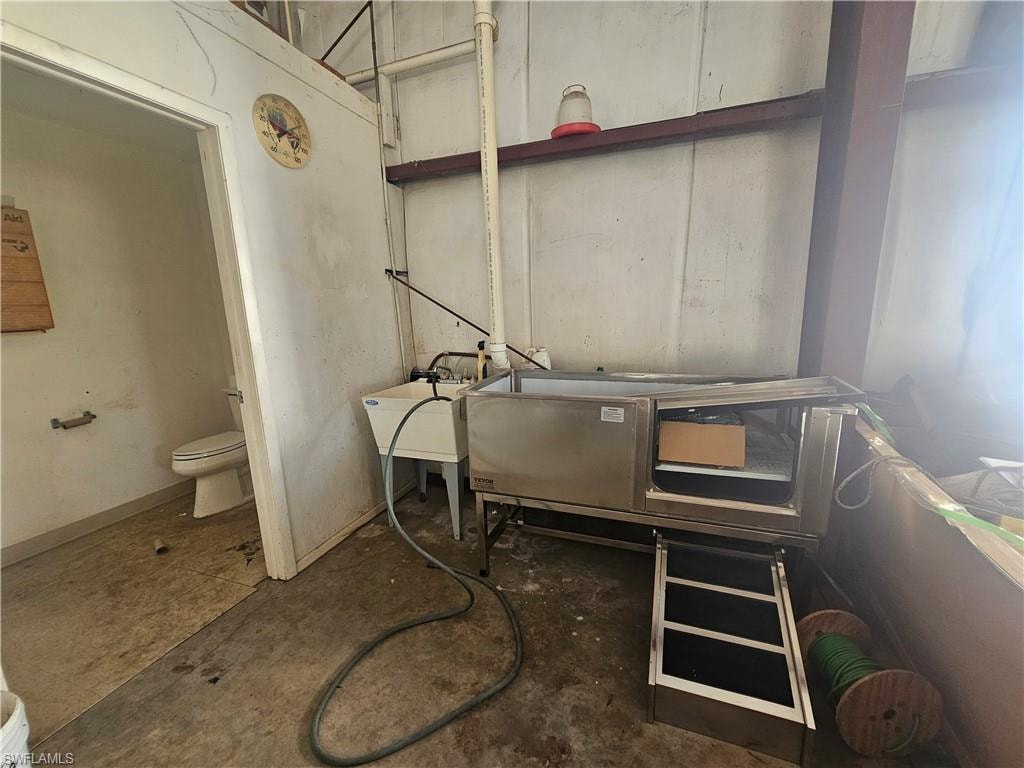 Miscellaneous room with a sink