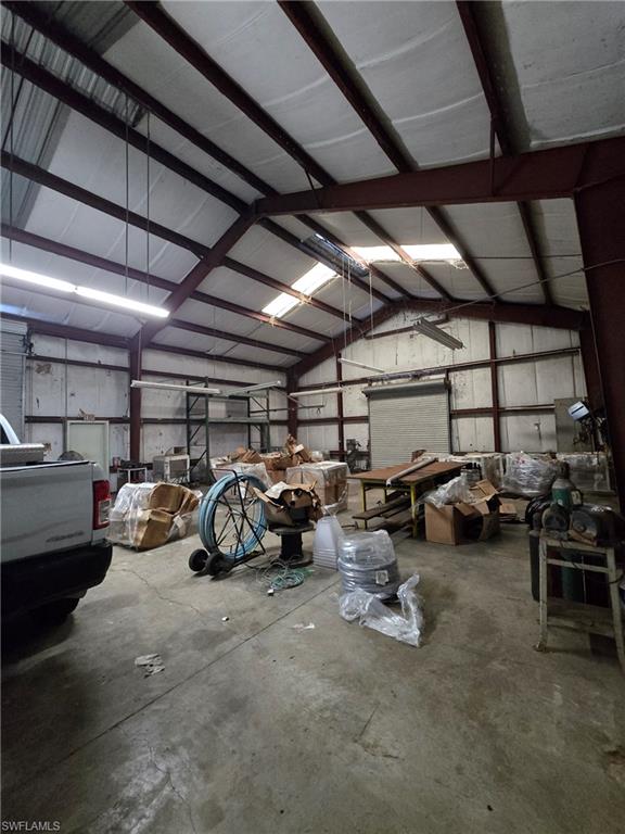 Garage featuring metal wall