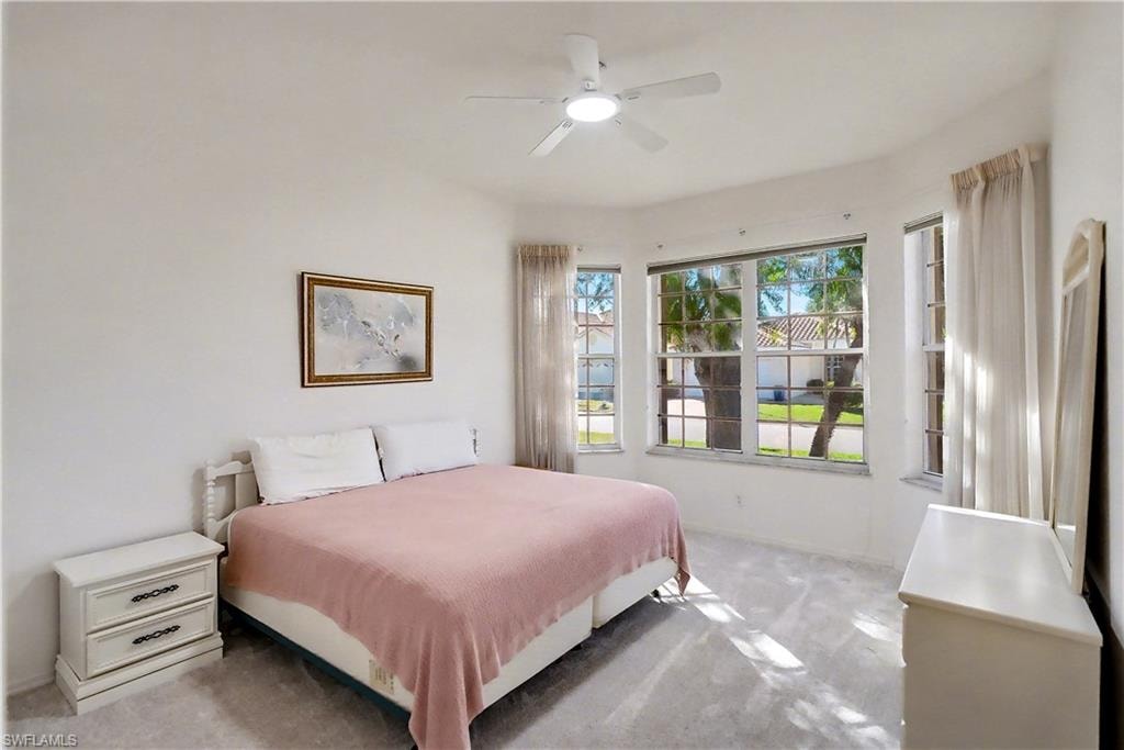Bedroom featuring carpet flooring and ceiling fan