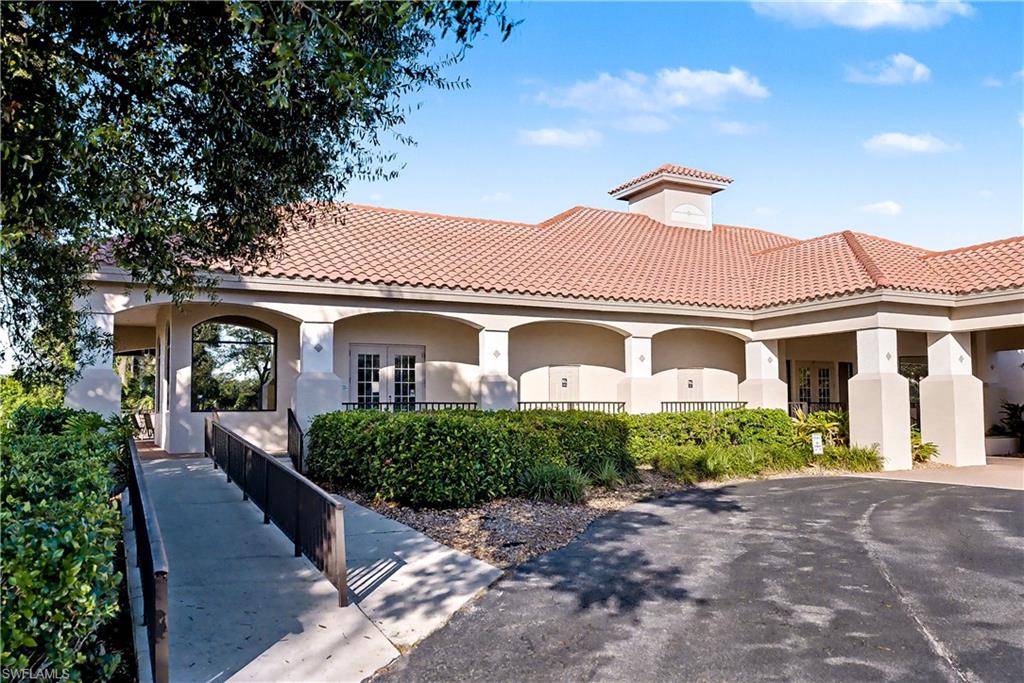Mediterranean / spanish-style home with stucco siding and a tile roof