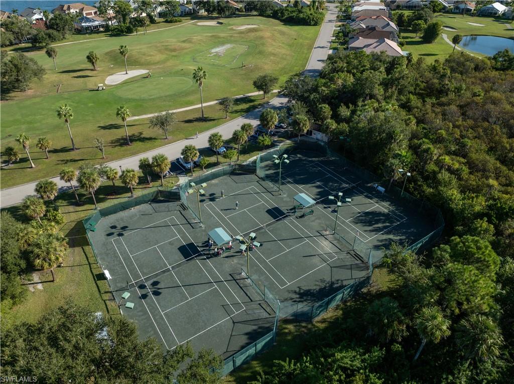 Bird's eye view of a local golf course and a large body of water