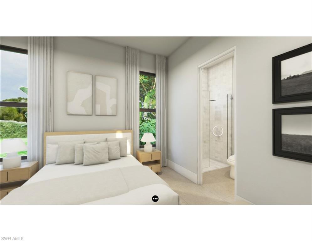 Bedroom with ensuite bath and light tile patterned floors