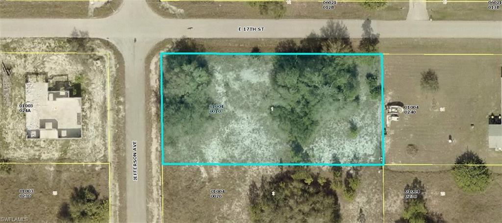 Aerial map of property and surrounding area with property parcel outlined