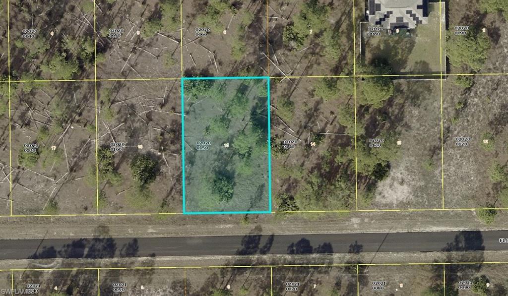Aerial overview of property's location featuring property parcel outlined