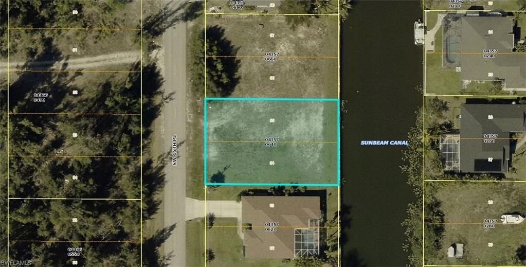 Aerial view of property's location featuring property parcel outlined