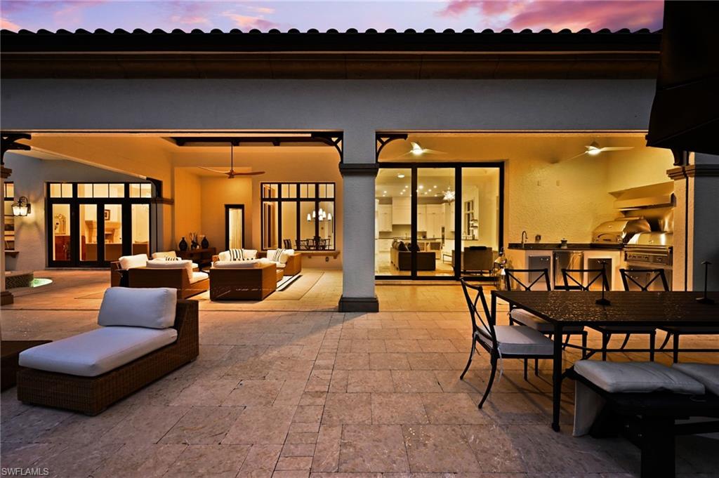 View of patio / terrace with ceiling fan, outdoor dining space, area for grilling, and outdoor lounge area