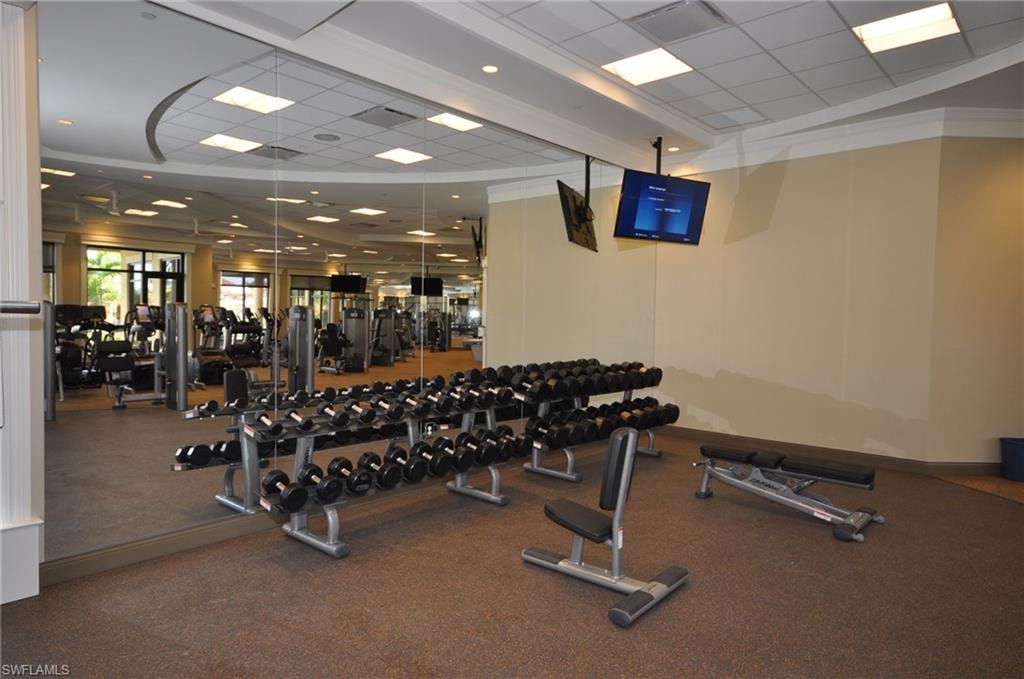 Exercise room featuring a drop ceiling